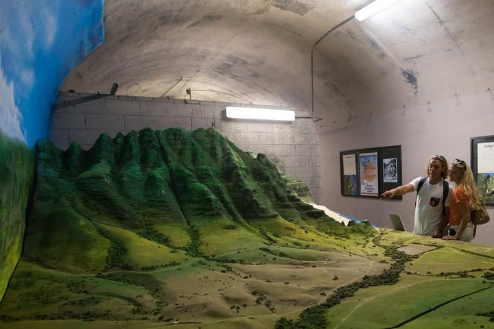 Sand sculpture display inside tent