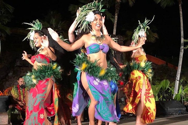 Tahitian dancers in colorful costumes