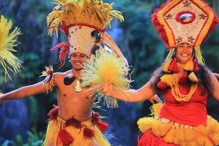 Tahitian dancers in red and yellow costumes